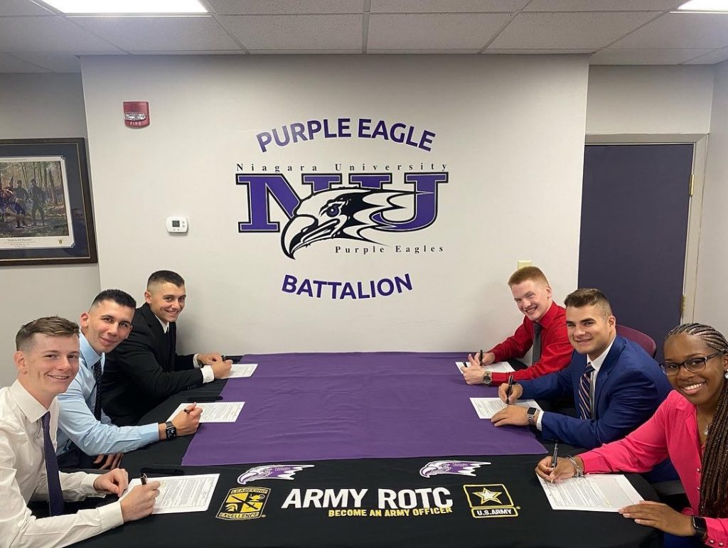 Prospective Students New prospective cadets signing their contracts to NU