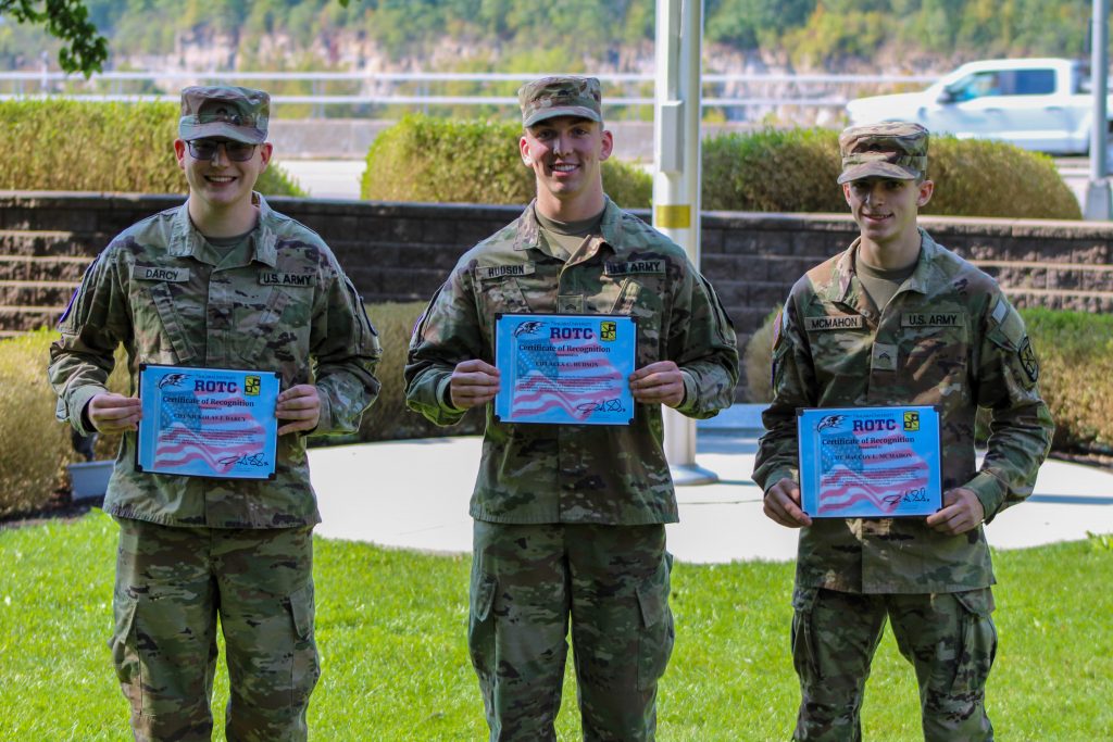 Three Cadets with their Certificate of Recognition